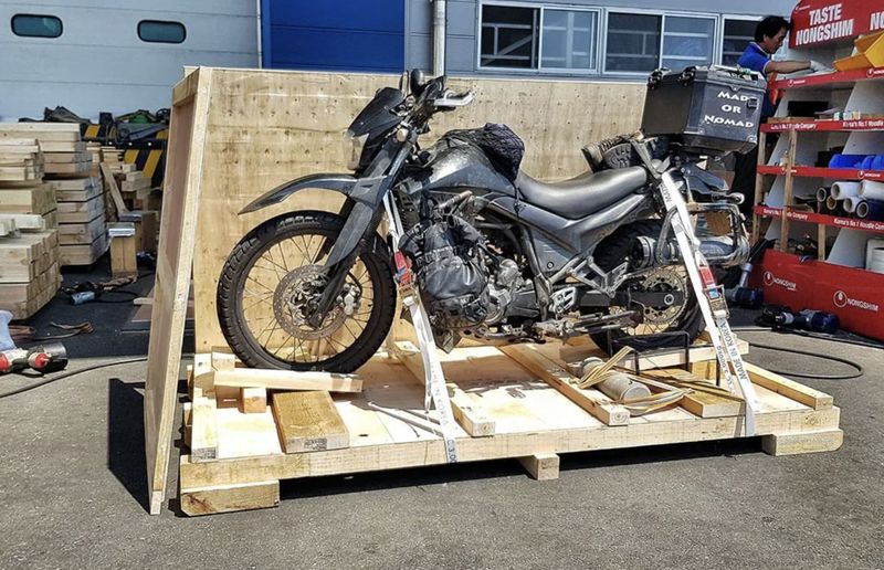 How do I ship a motorcycle overseas? Learn the complete, easy guide now, very quickly.