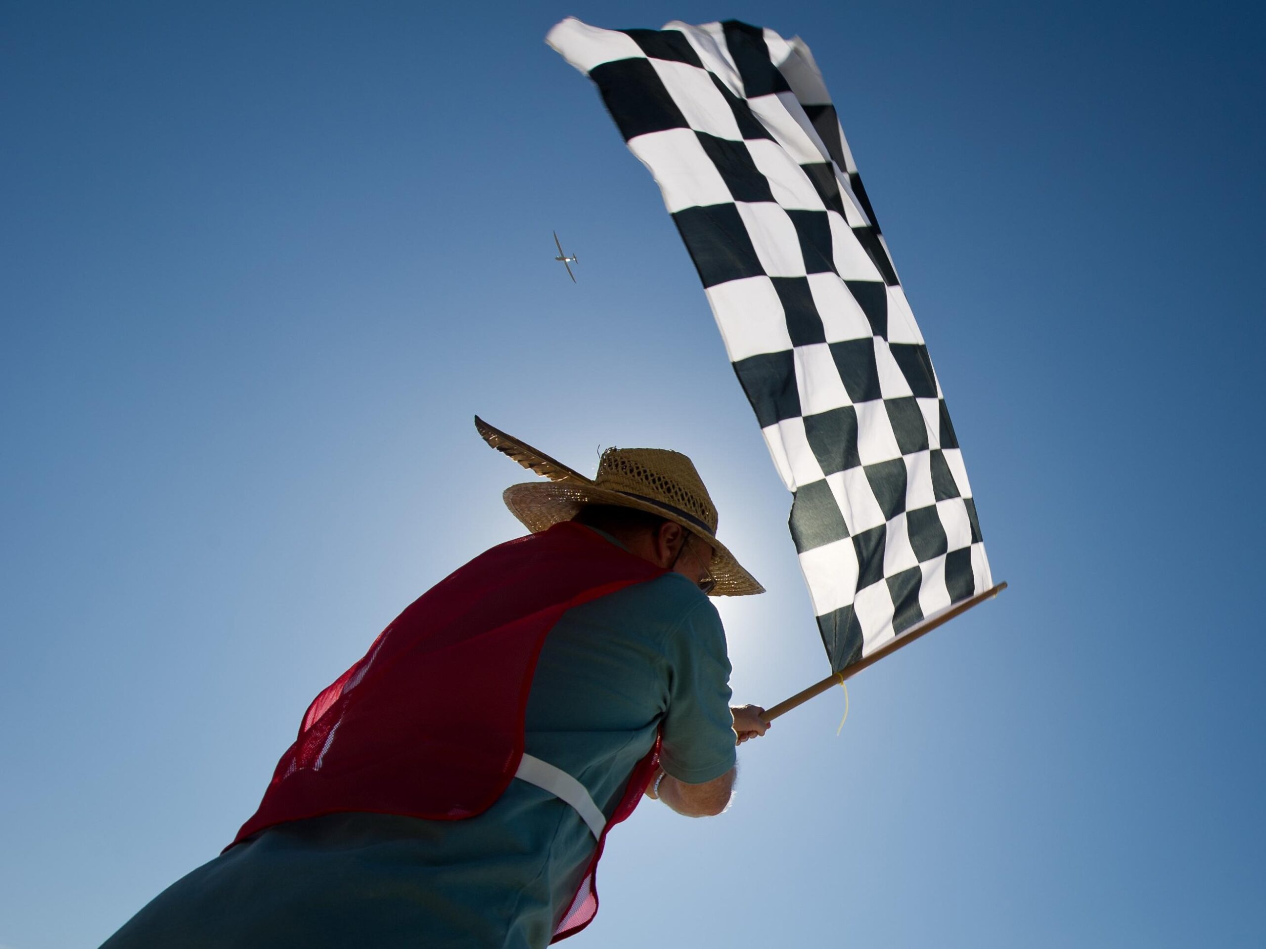 Why is waving the checkered flag such an exciting moment? Learn the history behind this symbol.