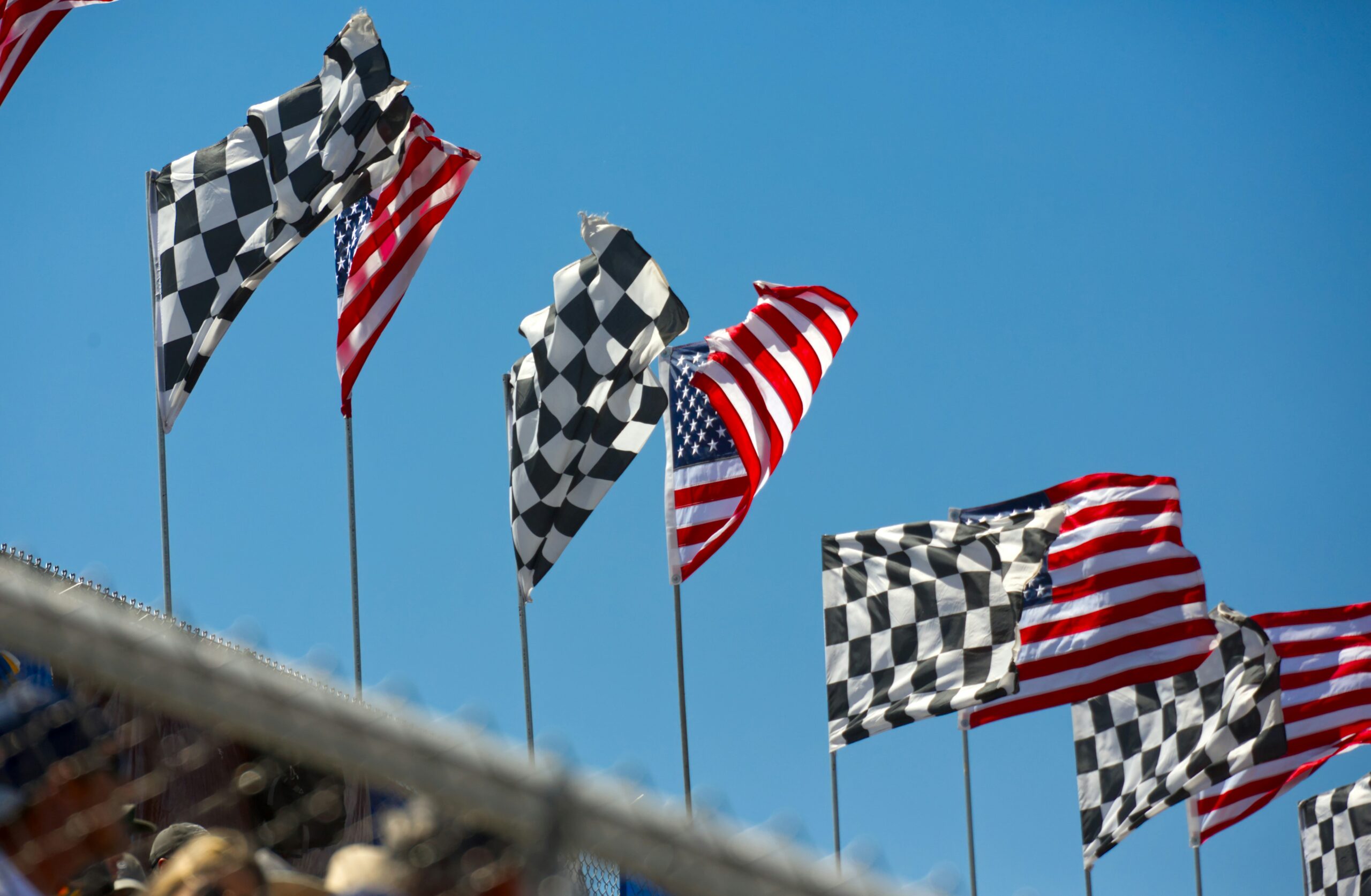 Why is waving the checkered flag such an exciting moment? Learn the history behind this symbol.
